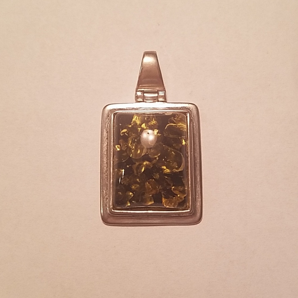 Green amber sterling silver pendant
